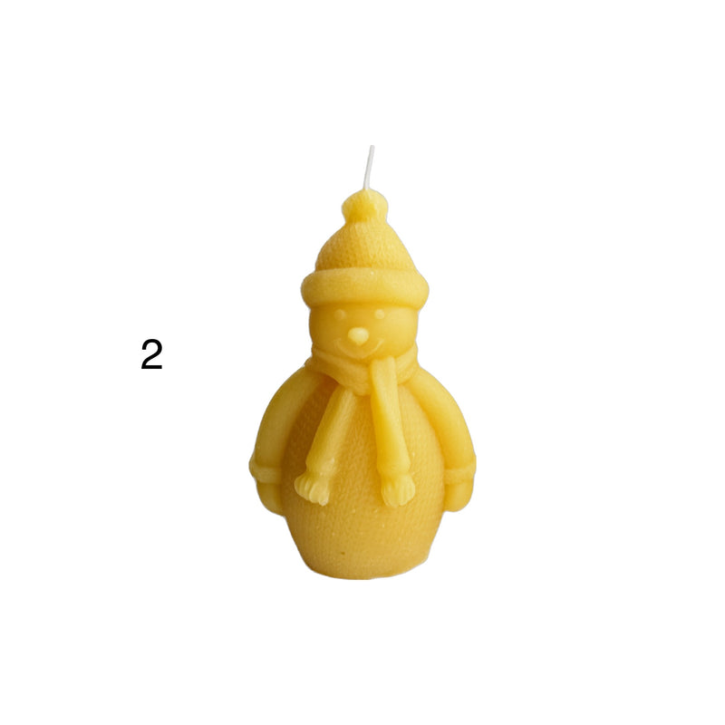 Snowman shaped beeswax candle.